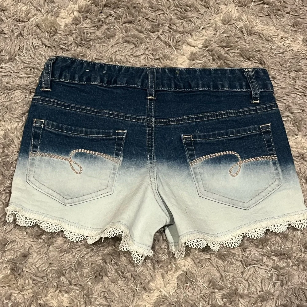 JUSTICE Girls Denim Shorts-  Size 10 These are cute and fashionable.